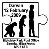 postmark showing progression from ape to man.