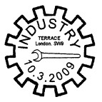 Postmark in shape of cog wheel.