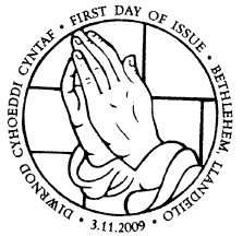 Postmark: Praying Hands text in English & Welsh.