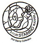 Postmark showing stained glass window.