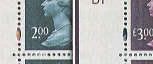 enlargement of £2 and £3 stamps showing '£'  sign missing from £2 stamp