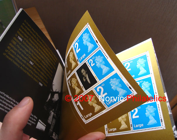 photograph showing Machin Anniversary prestige stamp book with 
pane 4 duplicated.