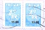 Belarus pair of 15r on 30k stamps.